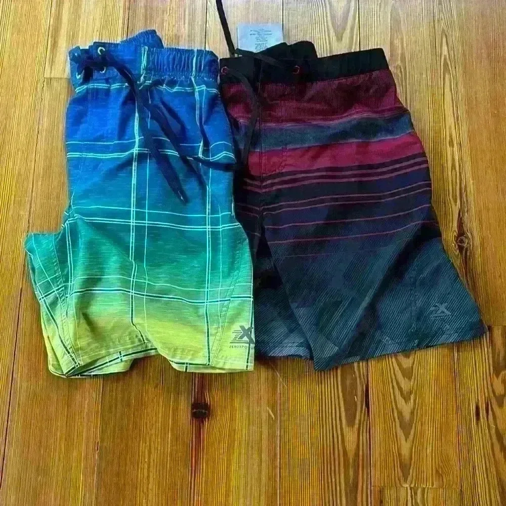 2 Pairs Of Men's Swim Trunks... ZX... ZeroXposur Size Large